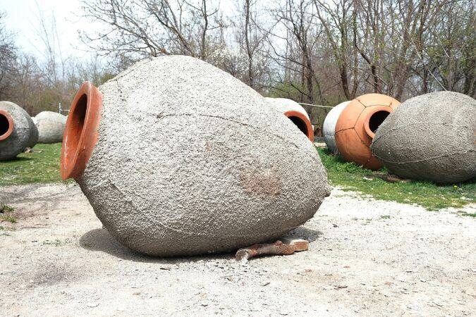 Georgian qvevri clay vessels used to make amber wine, the perfect wine for Aries
