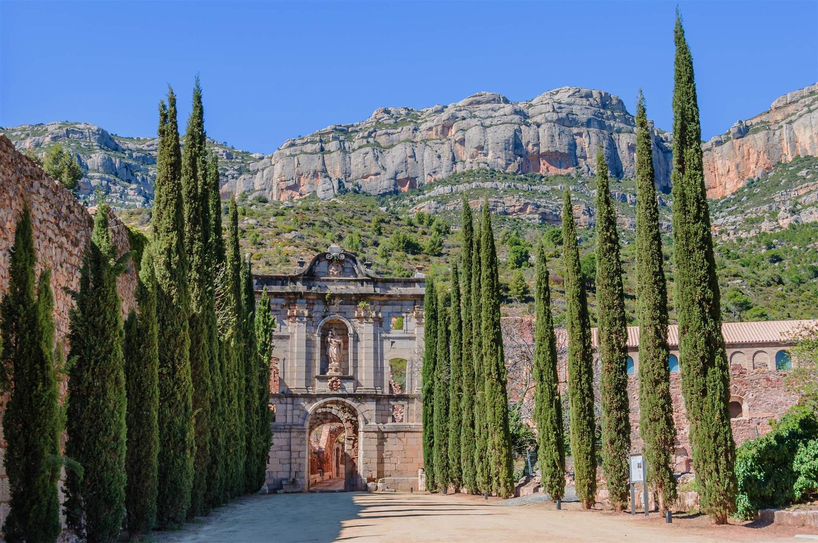 Scala Dei monastery and the slate hills of Priorat, home of the perfect wine for Sagittarius
